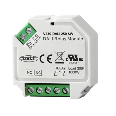 Close-up of a DALI relay module with green connectors and label details in a stylish white housing, ideal for efficient LED lighting control.
