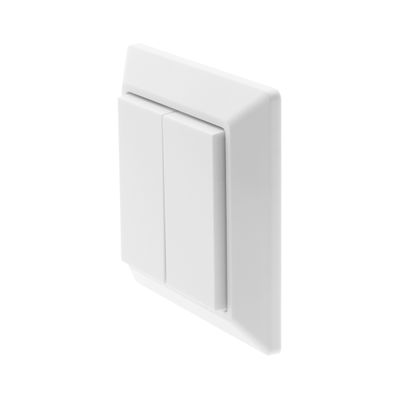 Side view of a double white light switch on the wall in a LED lighting shop for energy efficient solutions.
