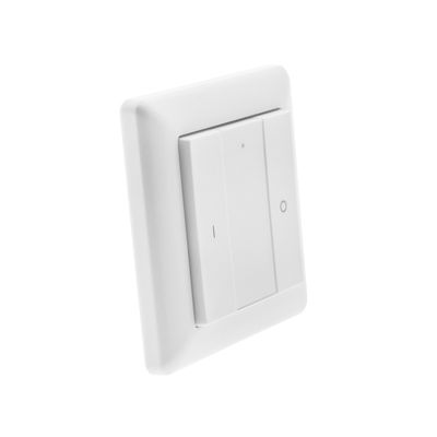 Close-up of a white LED light switch on a seamless white background, highlighting modern energy efficient lighting solutions.