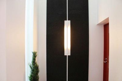 Line illuminated with acoustic tiles.