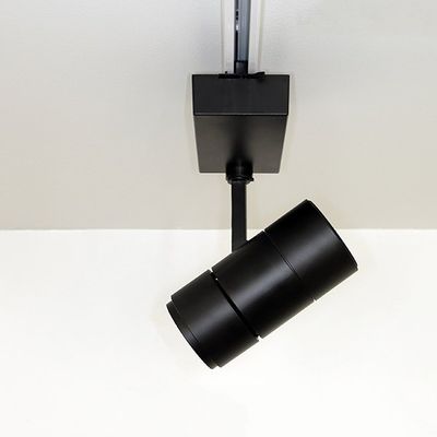 A stylish black ceiling light mounted on a right angle, perfect for contemporary spaces.