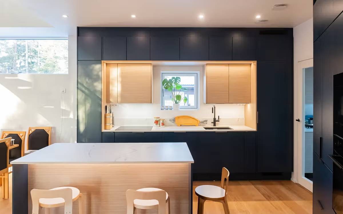 Kitchen LED lighting under wall cabinets, on top of cabinets and in the plinth