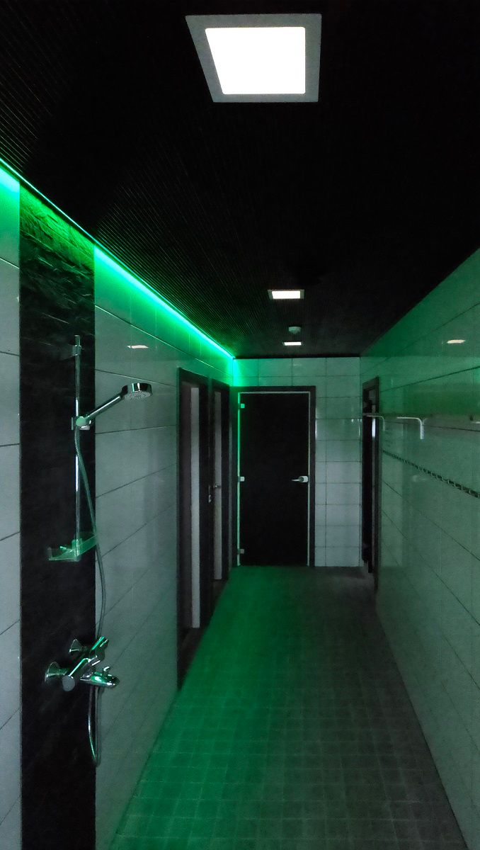 The lighting in the corridor is made of ribbon and Paneeli 200 flush-mounted luminaires photo by The Punchers