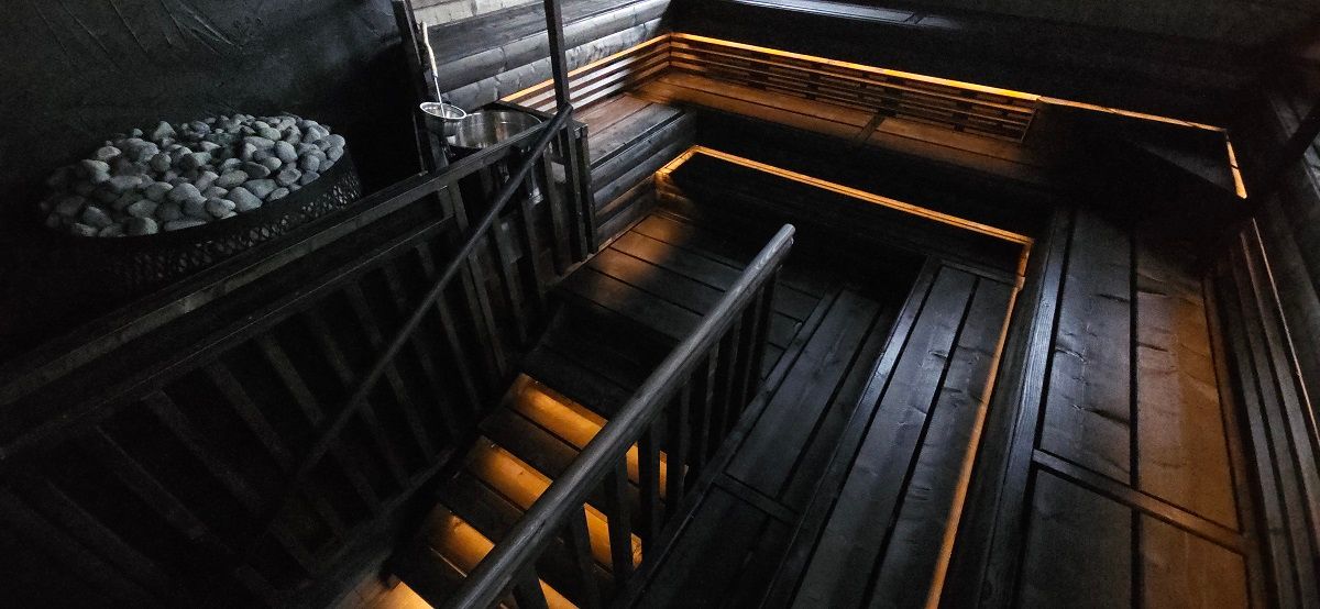 Led strip lighting is an atmospheric and stylish element in the sauna. Image from above. photo by The Punchers
