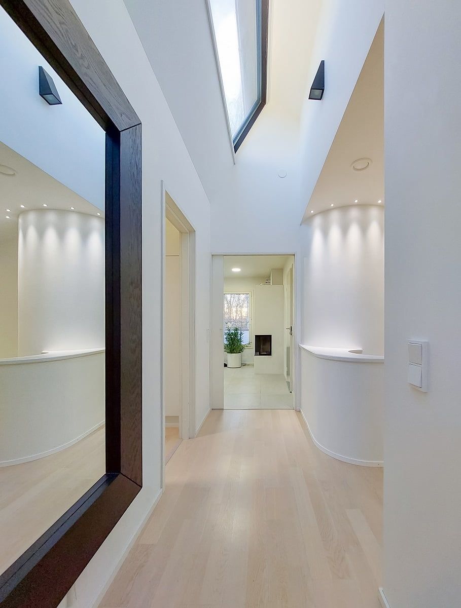 In the upstairs hallway, beautiful light is provided by the pillar spotlights as well as the skylight and indirect wall lights (not available) ©LedStore