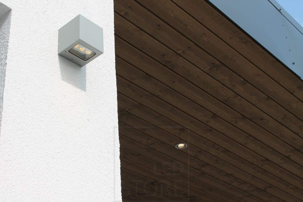 Housing Fair 2014: R023 brushed aluminium spotlight on the terrace roof, CUBIC2 exterior wall lights on the wall illuminating in one direction. Ledstore.fi