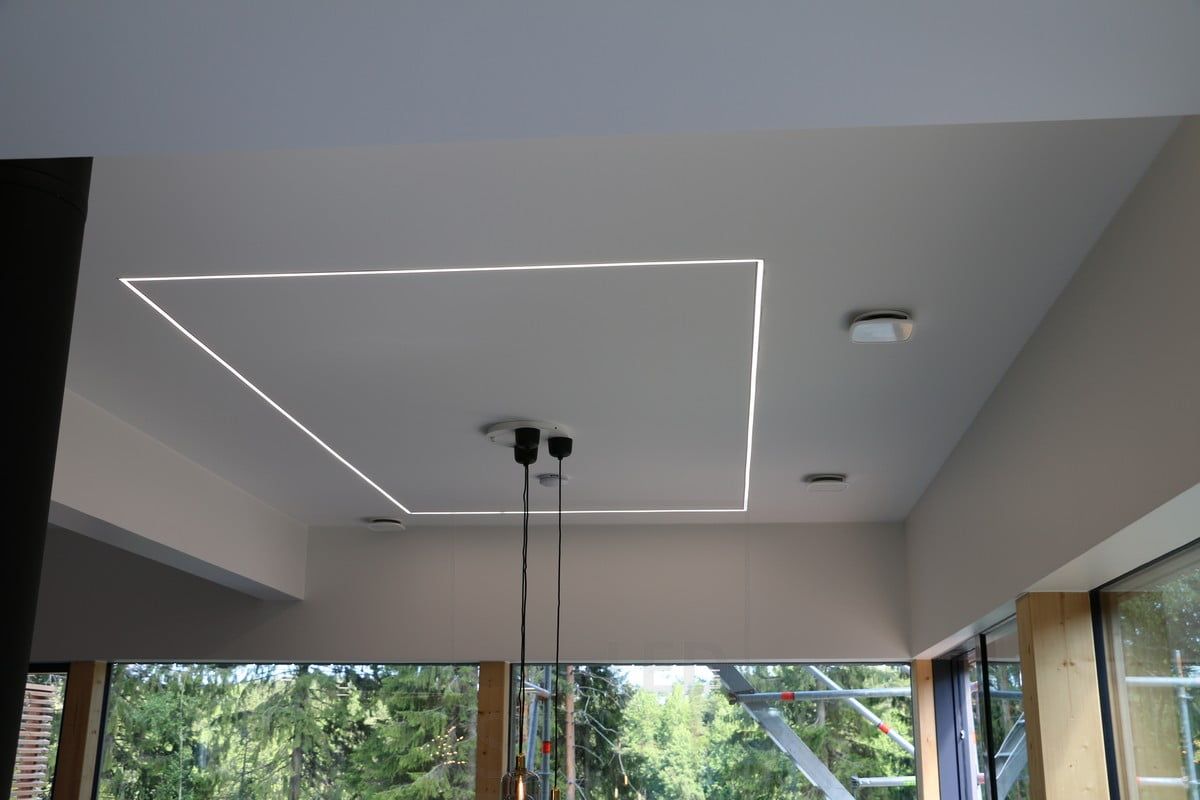Housing Fair 2019: Led strip light on the kitchen ceiling as a perimeter, mounted on a narrow flush-mounted profile. Ledstore.fi