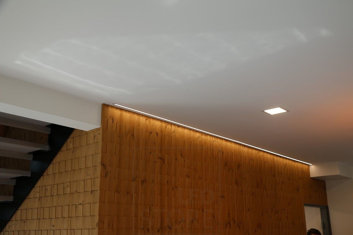 Housing Fair 2019: Led ribbon in a narrow flush profile illuminating an effect wall. Ledstore.fi