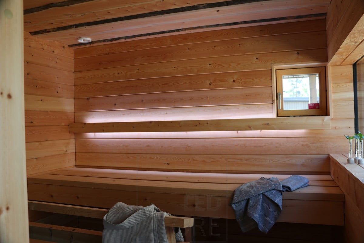 Housing Fair 2019: Led tape in the sauna behind the backrest. Light up and down. Ledstore.fi