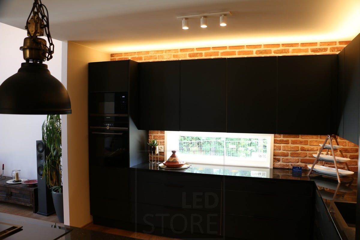 Housing Fair 2019: Black Kitchen indirect light on top of a cupboard. Ledstore.fi