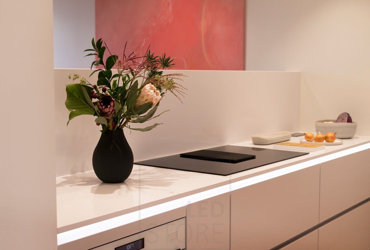 Housing Fair 2020: led profile at the bottom of the kitchen worktop illuminating indirect light. Ledstore.fi