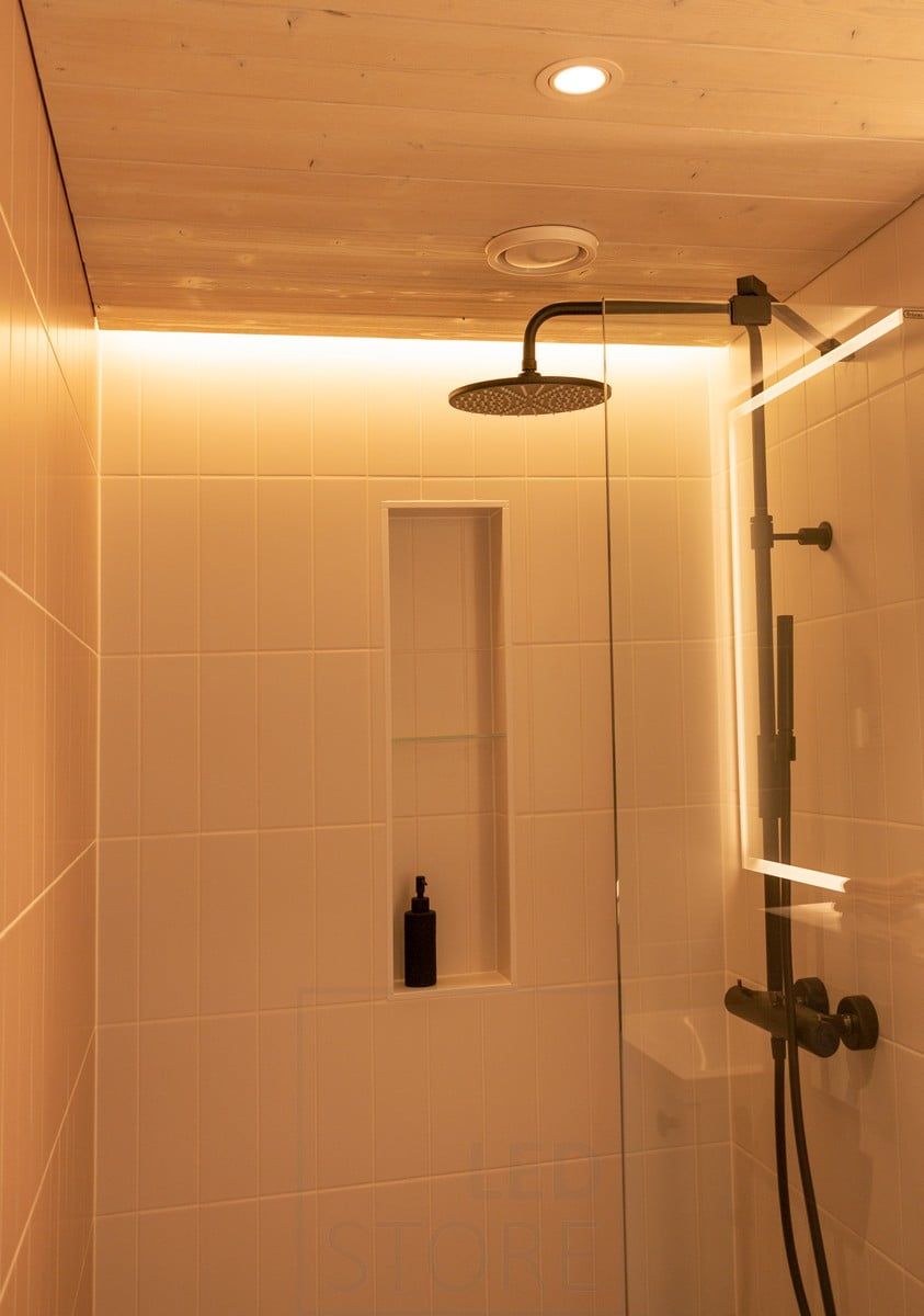 Housing Fair 2020: warm indirect light in the bathroom ceiling, implemented with an LED strip behind the ceiling profile. Ledstore.fi
