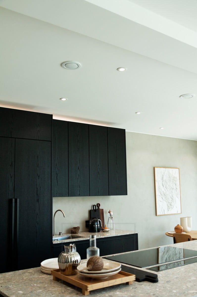 Housing Fair 2020: indirect light in the kitchen above the cabinets and spotlights creating effective general lighting. Ledstore.fi