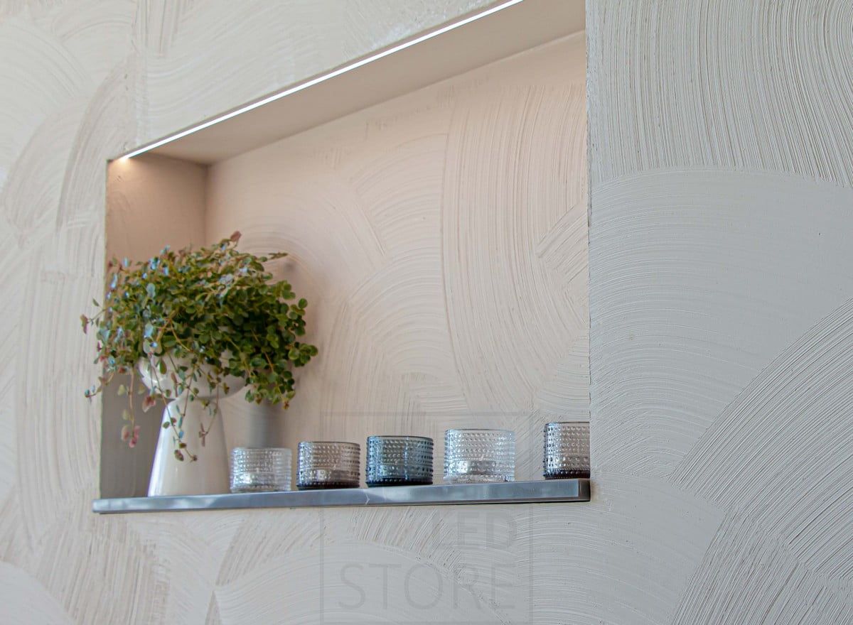 Housing Fair 2022: Led strip as shelf light on a plaster wall. Ledstore.fi