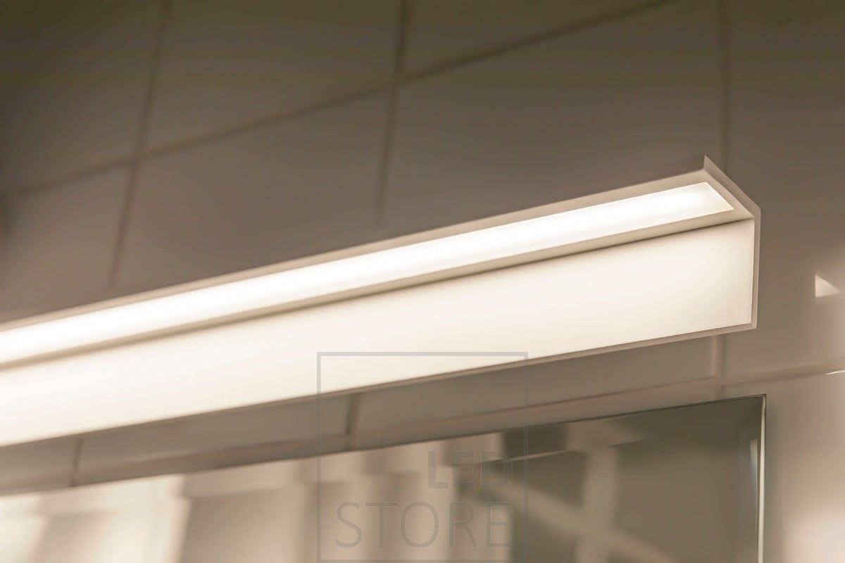 Blade wall light in the bathroom, illuminating the mirror. Ledstore.fi