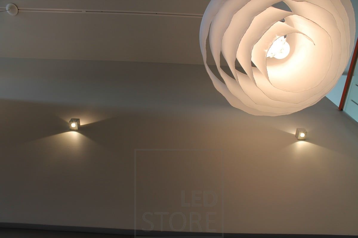 CUBIC led wall light in two directions, illuminating the space between the floors in two directions. Ledstore.fi