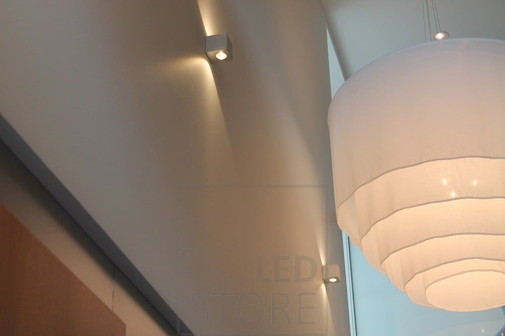 CUBIC led wall light in two directions, emphasizing the height of the space and illuminating the room with atmospheric light through the wall. Ledstore.fi