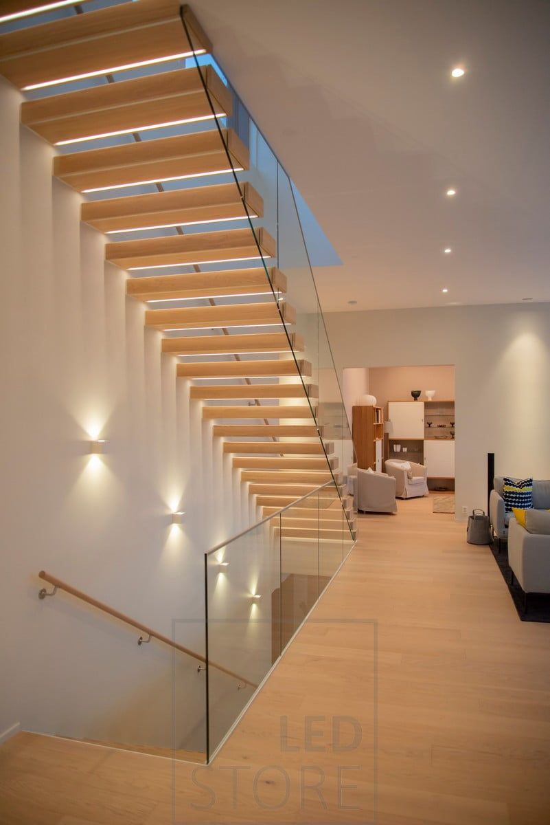 CUBIC led wall lights illuminating and highlighting the stairs in two directions. Ledstore.fi