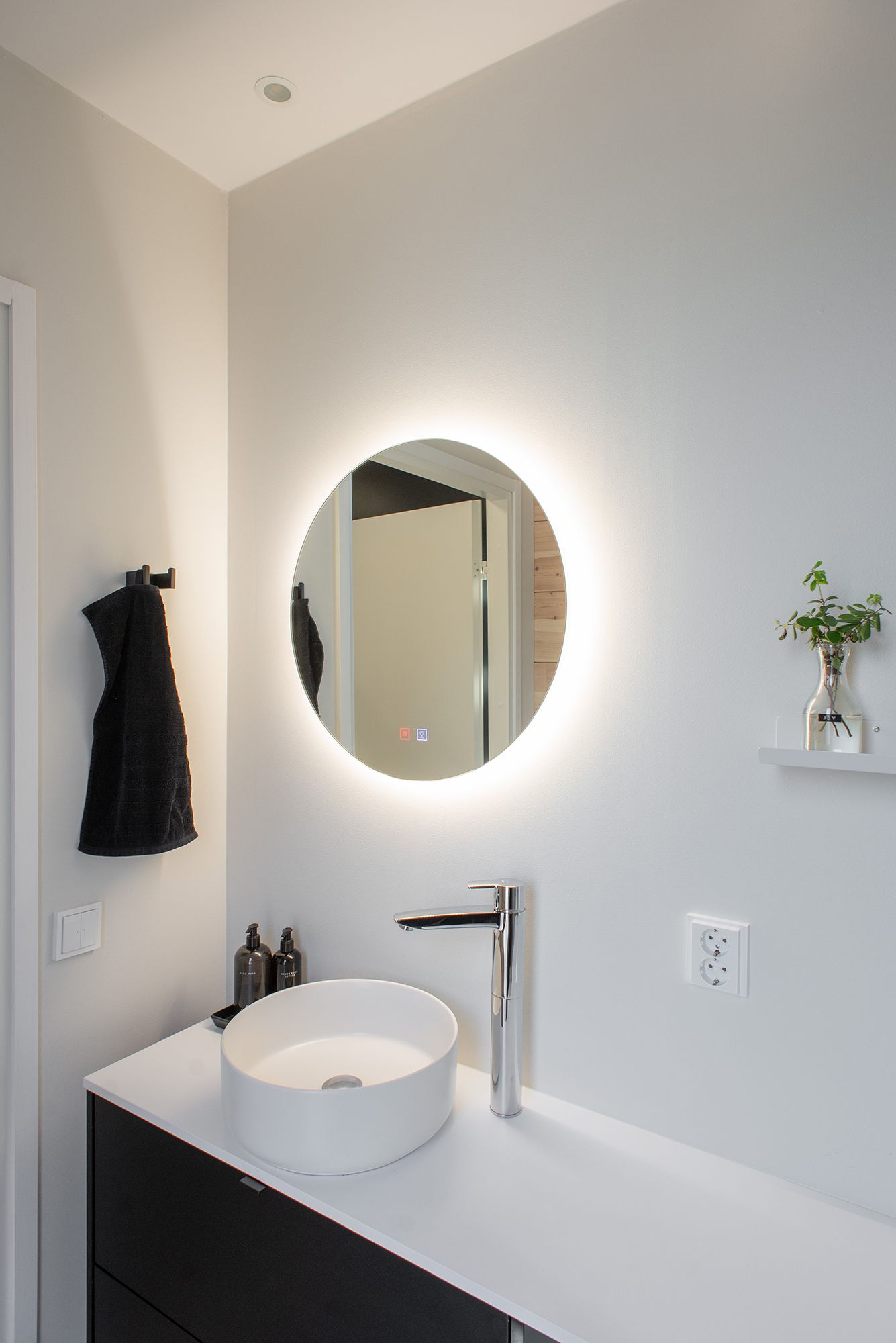 A circular light mirror bringing light to the pool level. Ledstore.fi