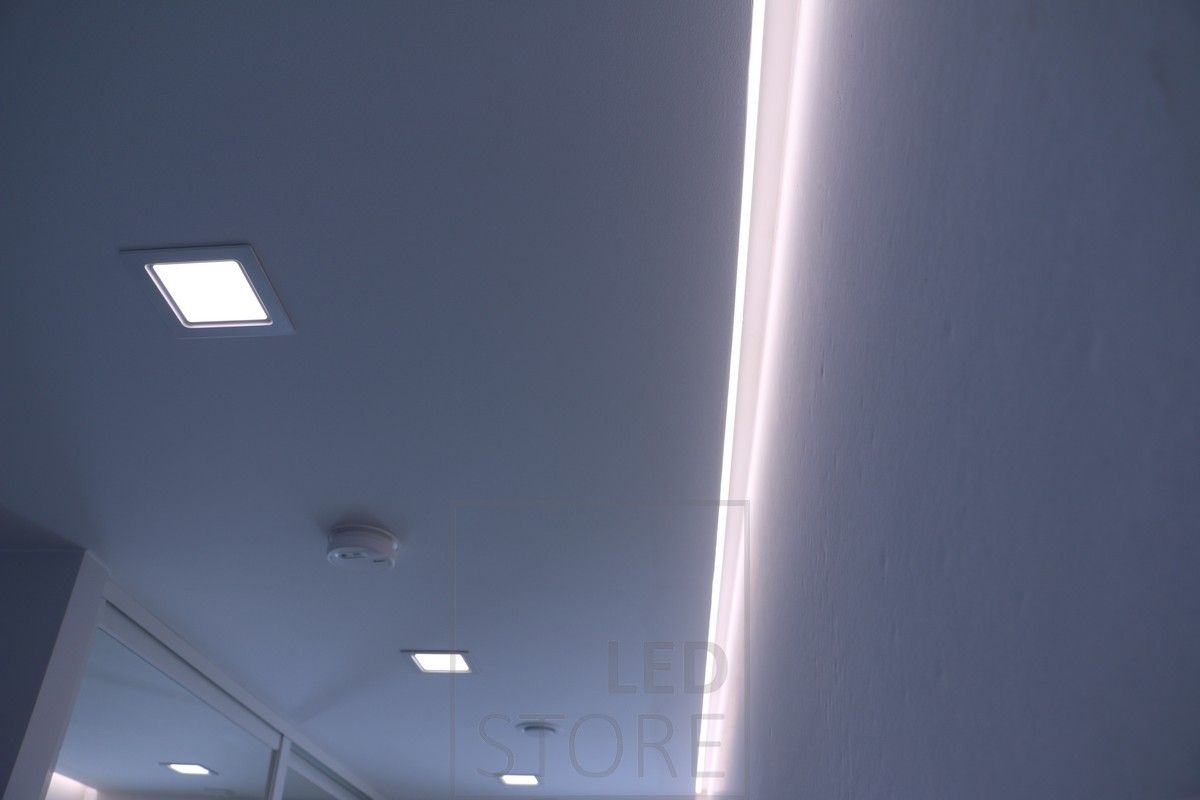 Indirect lighting at the ceiling boundary combined with general lighting using Panel luminaires. Ledstore.fi