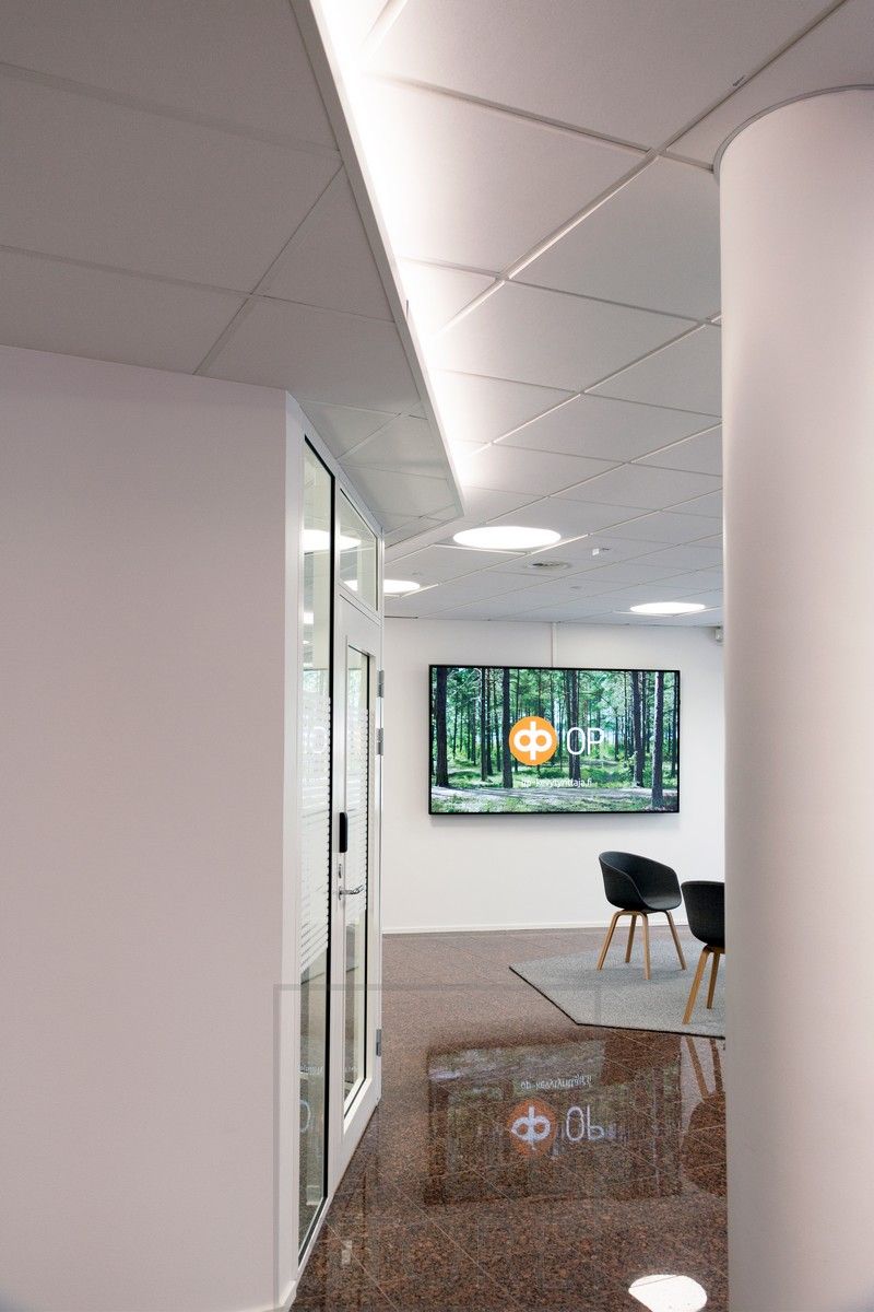 Corridor lighting with LED strip mounted on a downlight box.