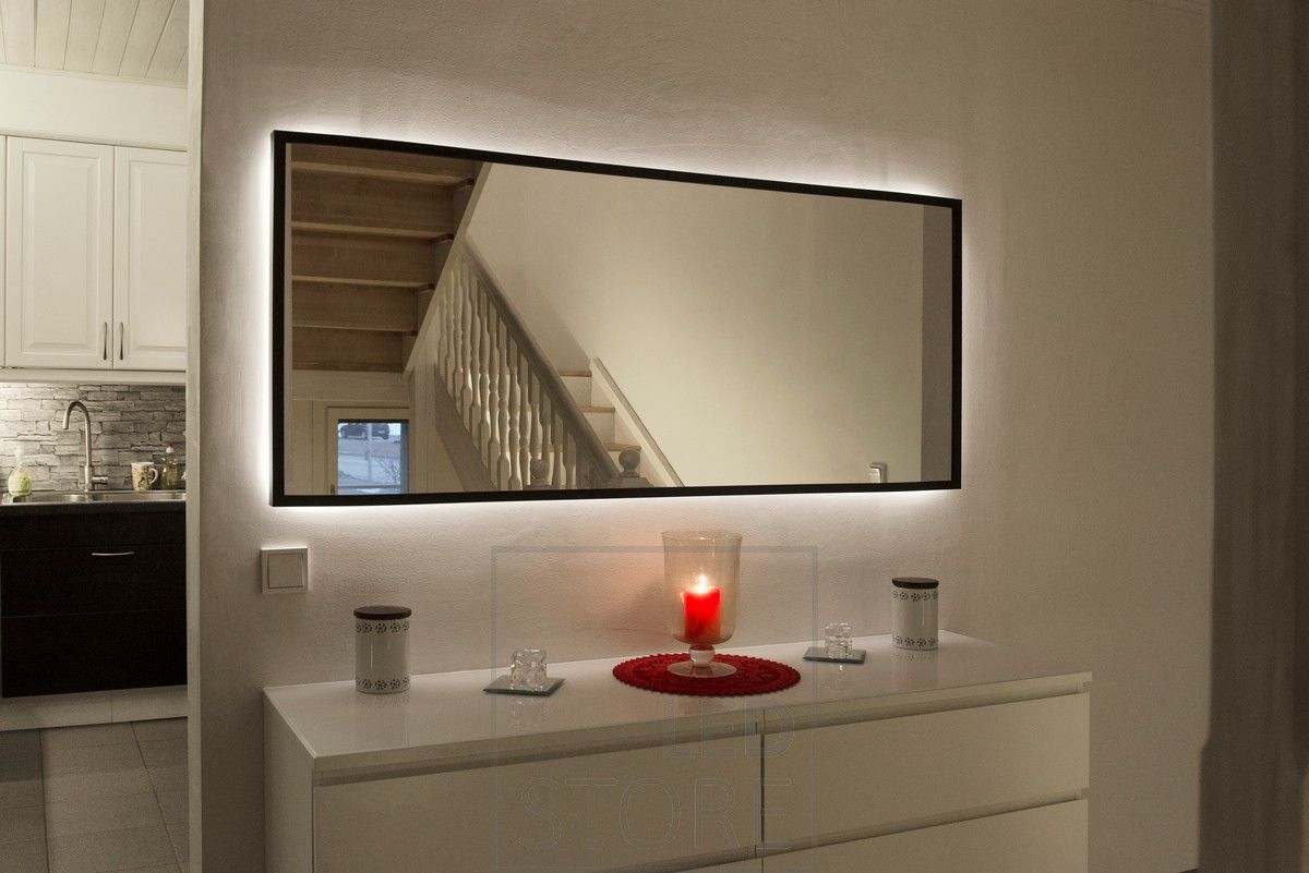 LED ribbon behind the mirror to create a moody light and highlight the mirror. Ledstore.fi