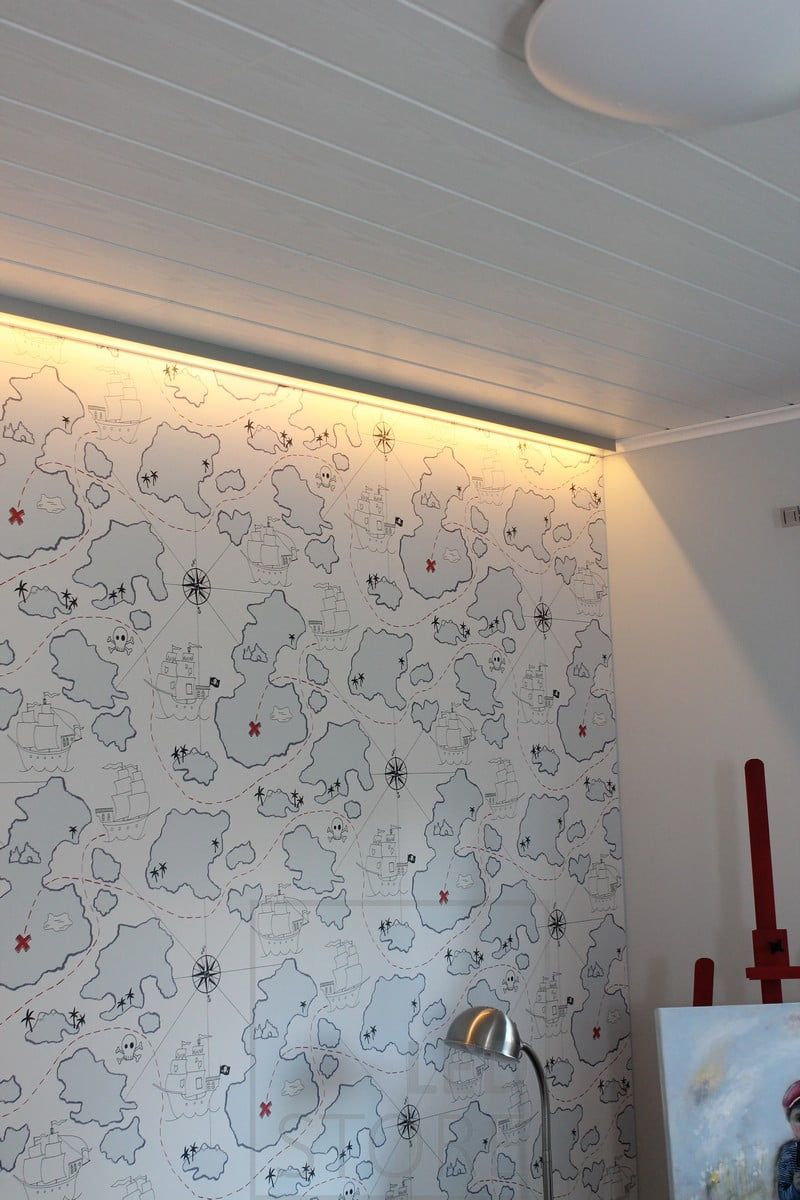 Atmospheric light with led strip. Indirect lighting highlights the wallpaper on the wall. Ledstore.fi