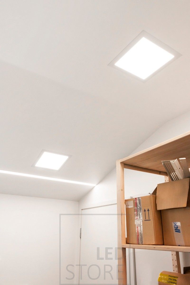 Garage lighting with 2 pieces of Led panel 300x300 Drywall on the ceiling, as well as a recessed led profile with led strip.