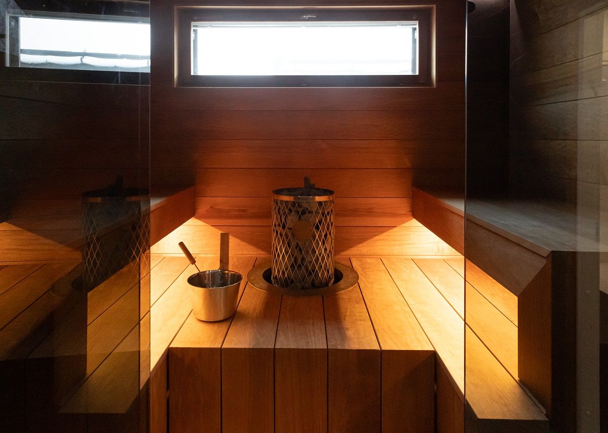 LED strip installed under the sauna ceiling on both sides.