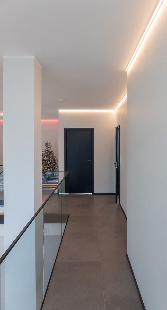 Upstairs platform illuminated by LED strip.