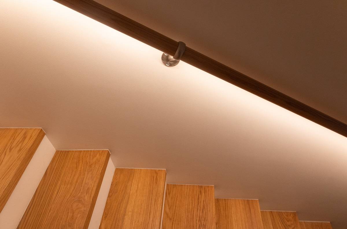 LED strip on a stair railing.