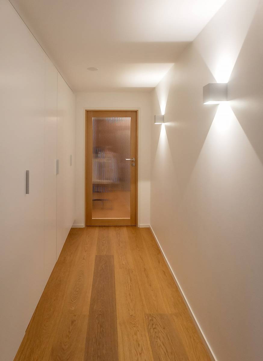 Two FUNK wall lamps in the hallway.
