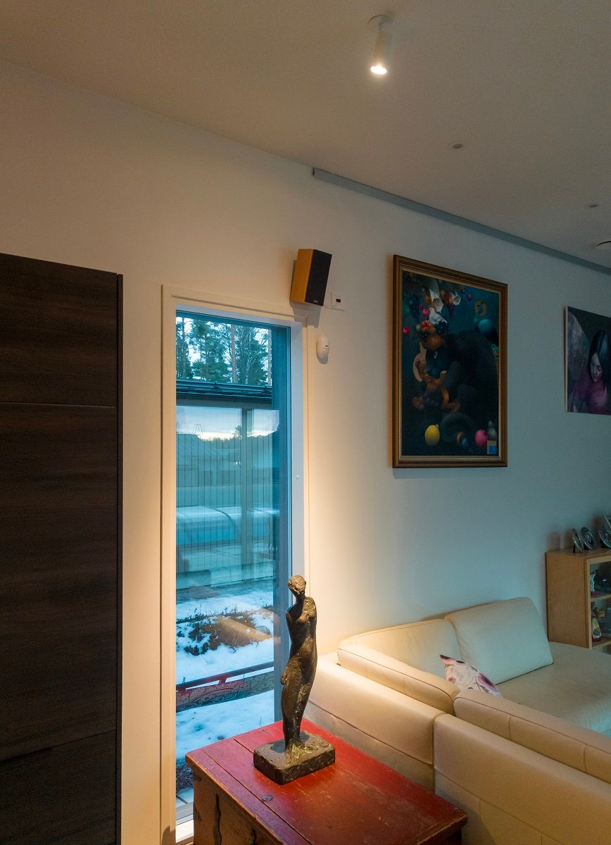 LED FOCUS recessed luminaire with light directed at a work of art.