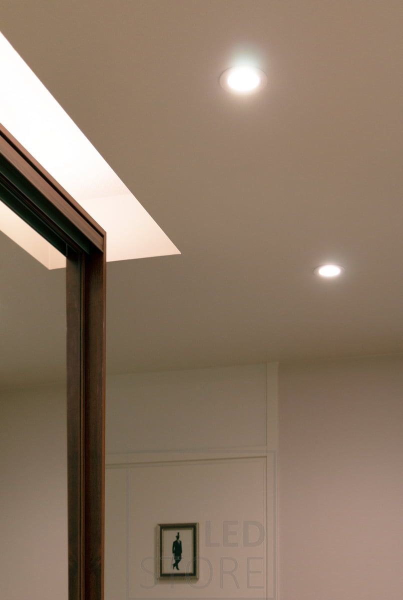 On top of the sliding door cabinet in the hallway, an LED strip in white surface profile and 7.2 W/m with atmospheric CCT LED strip illuminates the ceiling. LedStore.fi