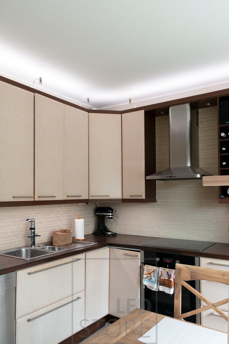 In the kitchen, CCT LED strips in aluminium profile with colour temperature control were installed as additional lighting on top of the cabinets and on the worktops. Wireless dimming and CCT control. LedStore.fi
