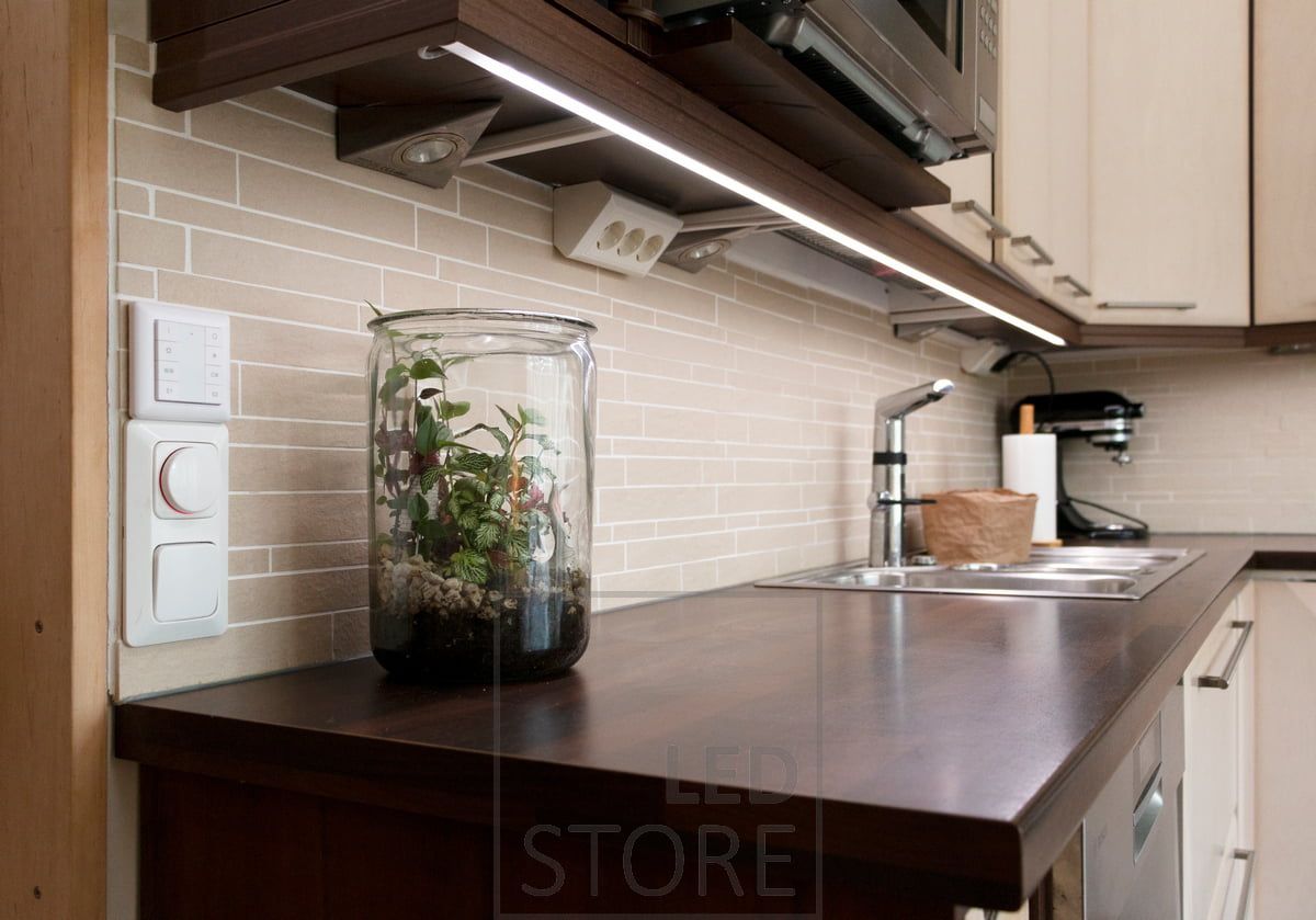 Corner halogens and LED strip are suitable for countertop lighting, as the LED strip is mounted on the front edge of the countertop and the halogens on the back edge. LedStore.fi
