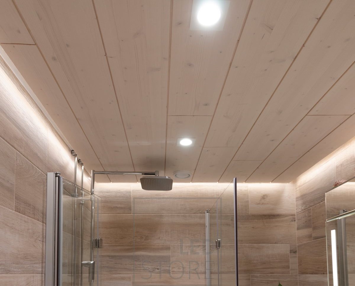 A groove was made in the ceiling panel for all the walls of the bathroom. 2 Fixed Kantti 9W spots were chosen in the middle of the room. LedStore.fi