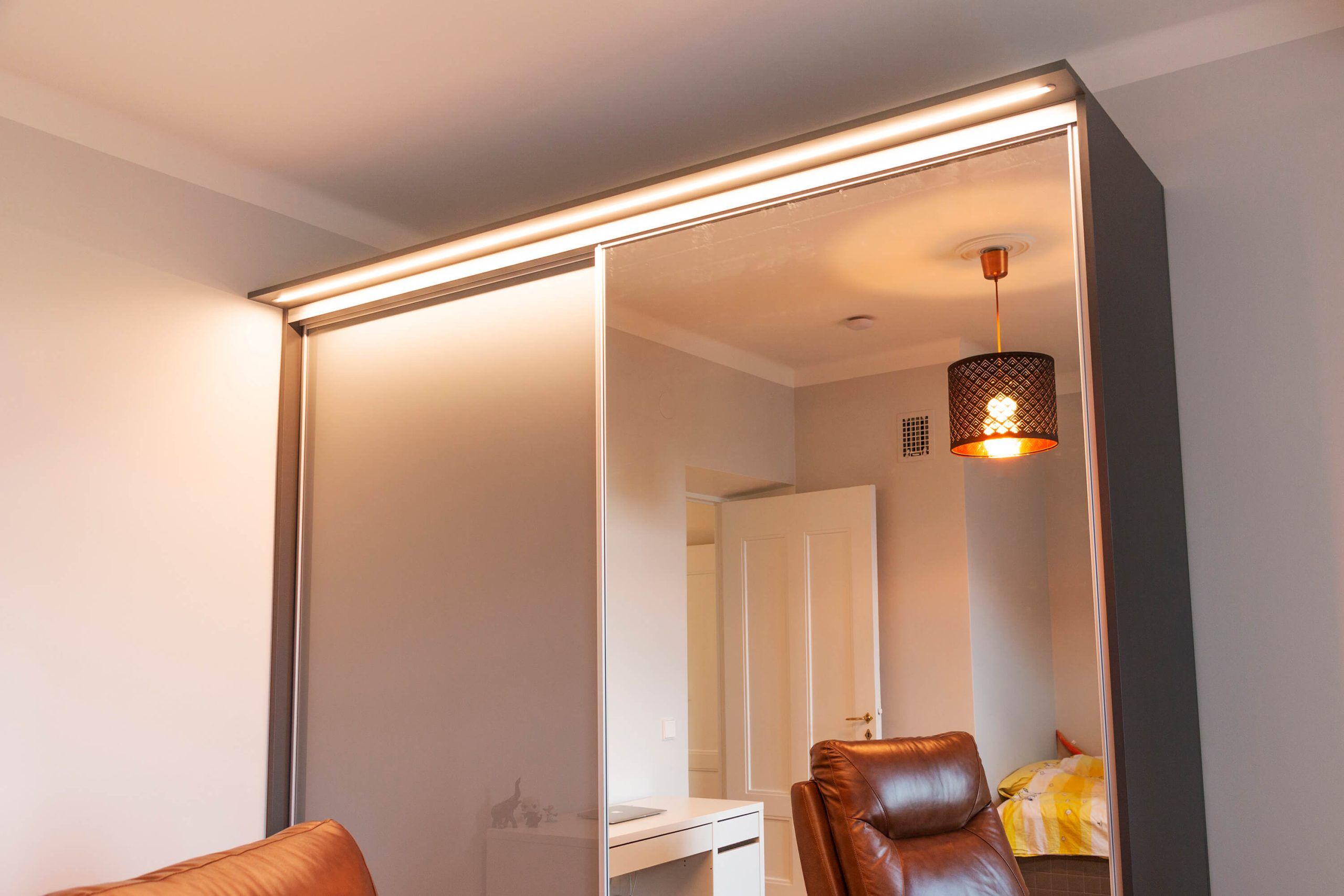 Led ribbon mounted on the top lip of a wardrobe, LedStore.fi