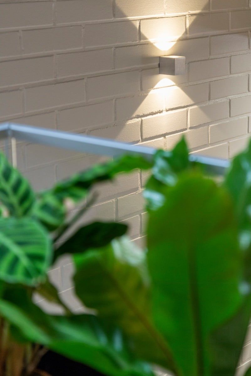 Text on a green background that reads "LED STORE" in white capital letters within a white central square, promoting energy efficient lighting solutions.
