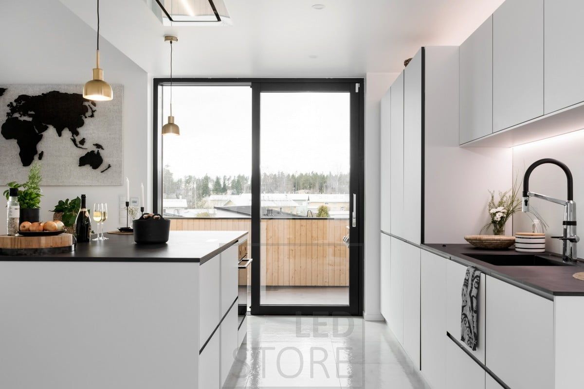 Led strips for indirect lighting in the kitchen area and on top of the cabinets. Ledstore.fi