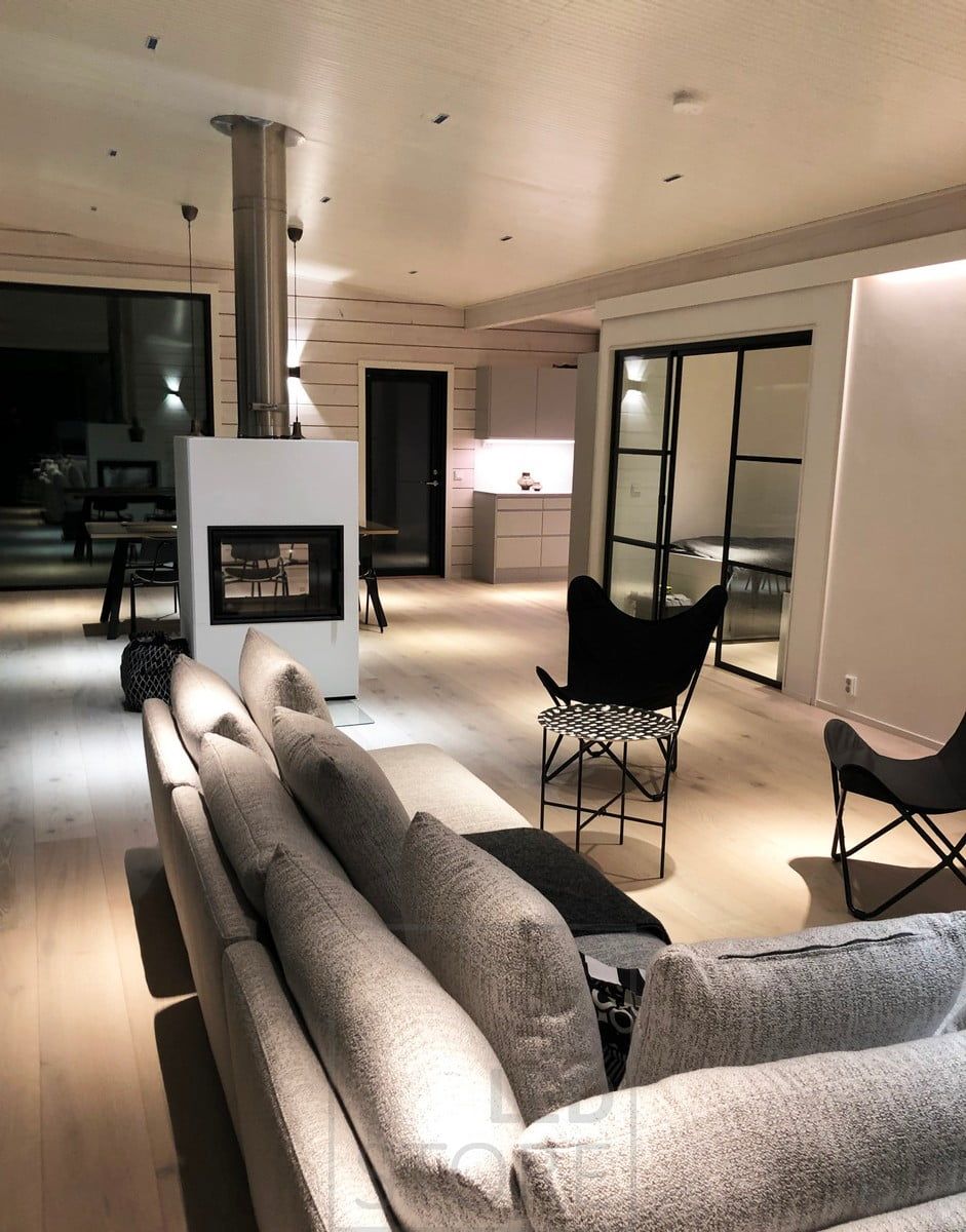 Atmospheric lighting achieved with narrow-angle spotlights, wall lights and LED strip lights and interior lighting. Ledstore.fi
