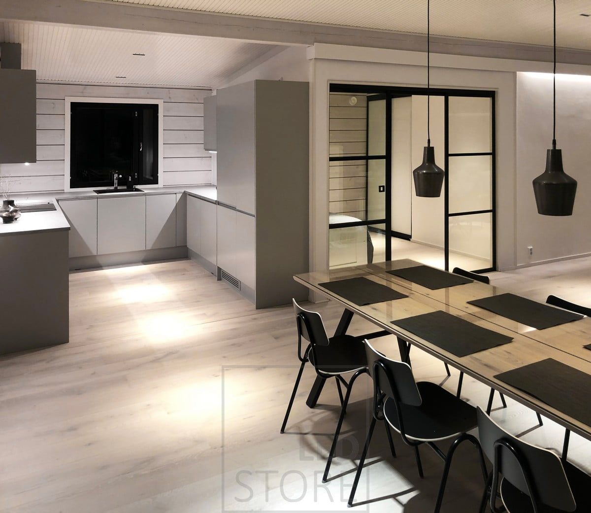 LINJA 5 spots on the ceiling, LED strips in the kitchen and behind the ceiling grid. Ledstore.fi