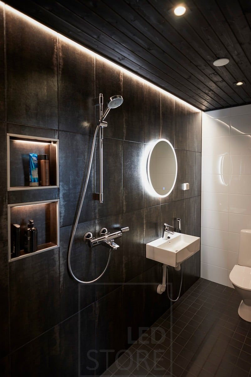 Versatile bathroom lighting implemented with LED strip lighting, LED spotlights and LED light mirrors. Ledstore.fi
