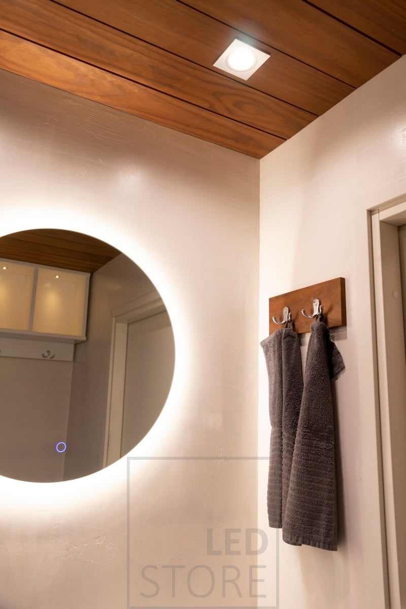 MOON circular light mirror combined with KANTTI spots. The lighting is fully colour temperature adjustable and dimmable. Ledstore.fi