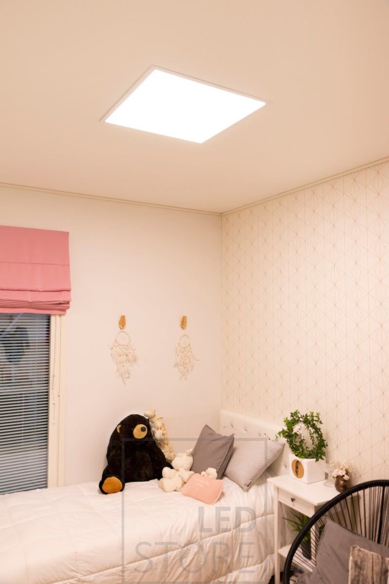 Bedroom ceiling with UPPOAVA panel 600x600. The luminaire resembles a skylight and is colour temperature adjustable. Ledstore.fi