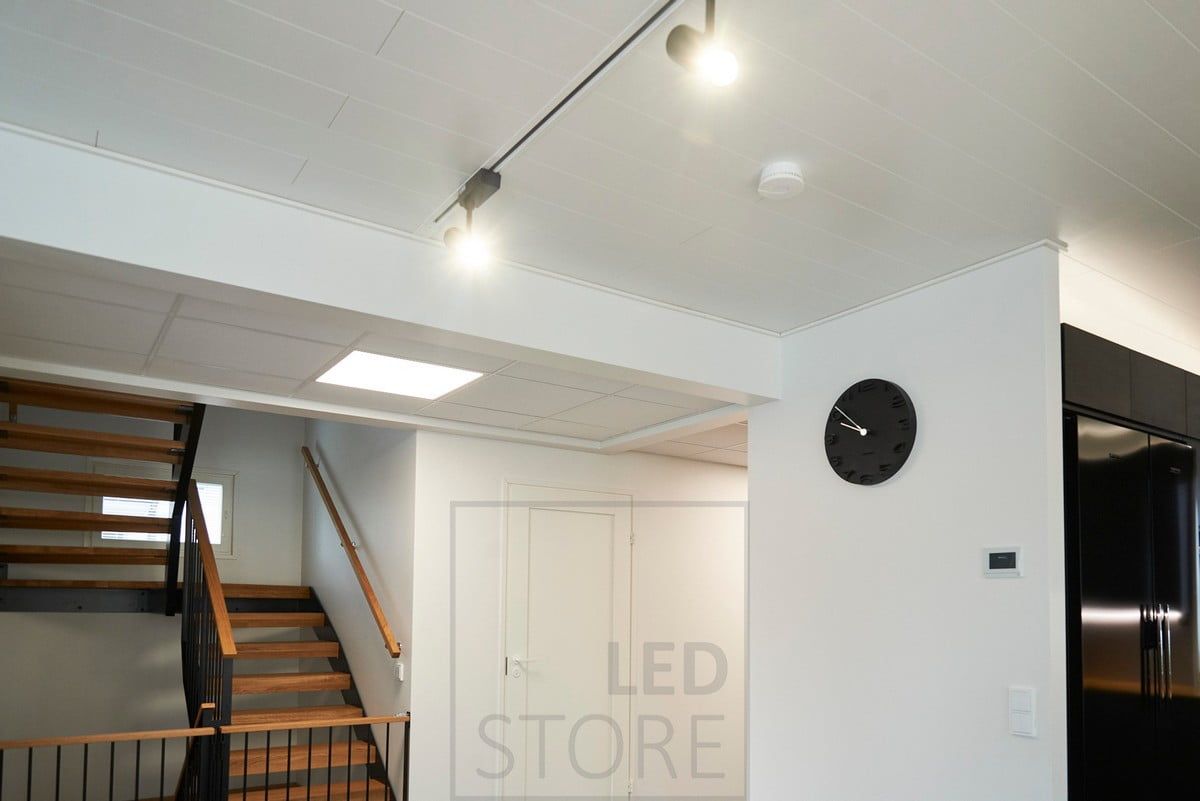 A large 600x600 led panel luminaire in the lobby creating a skylight effect. Ledstore.fi