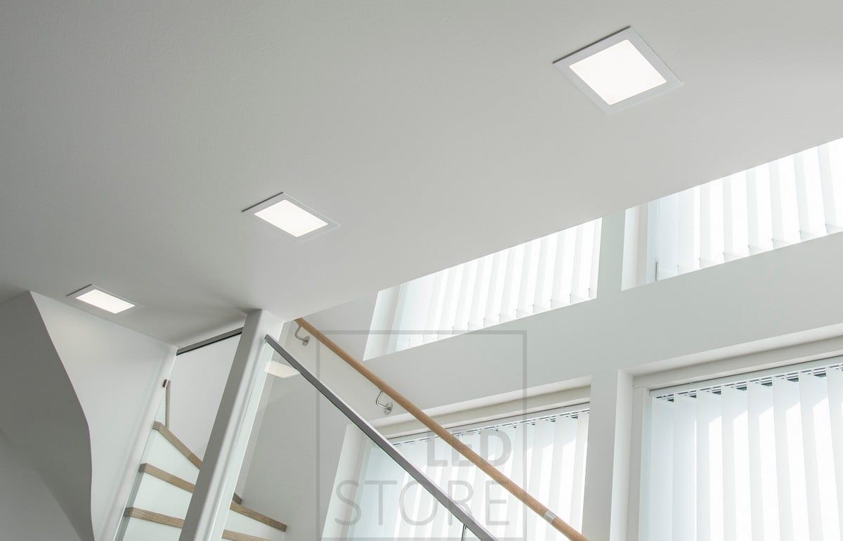 Minimalist panel lights blend beautifully with the white ceiling. Ledstore.fi