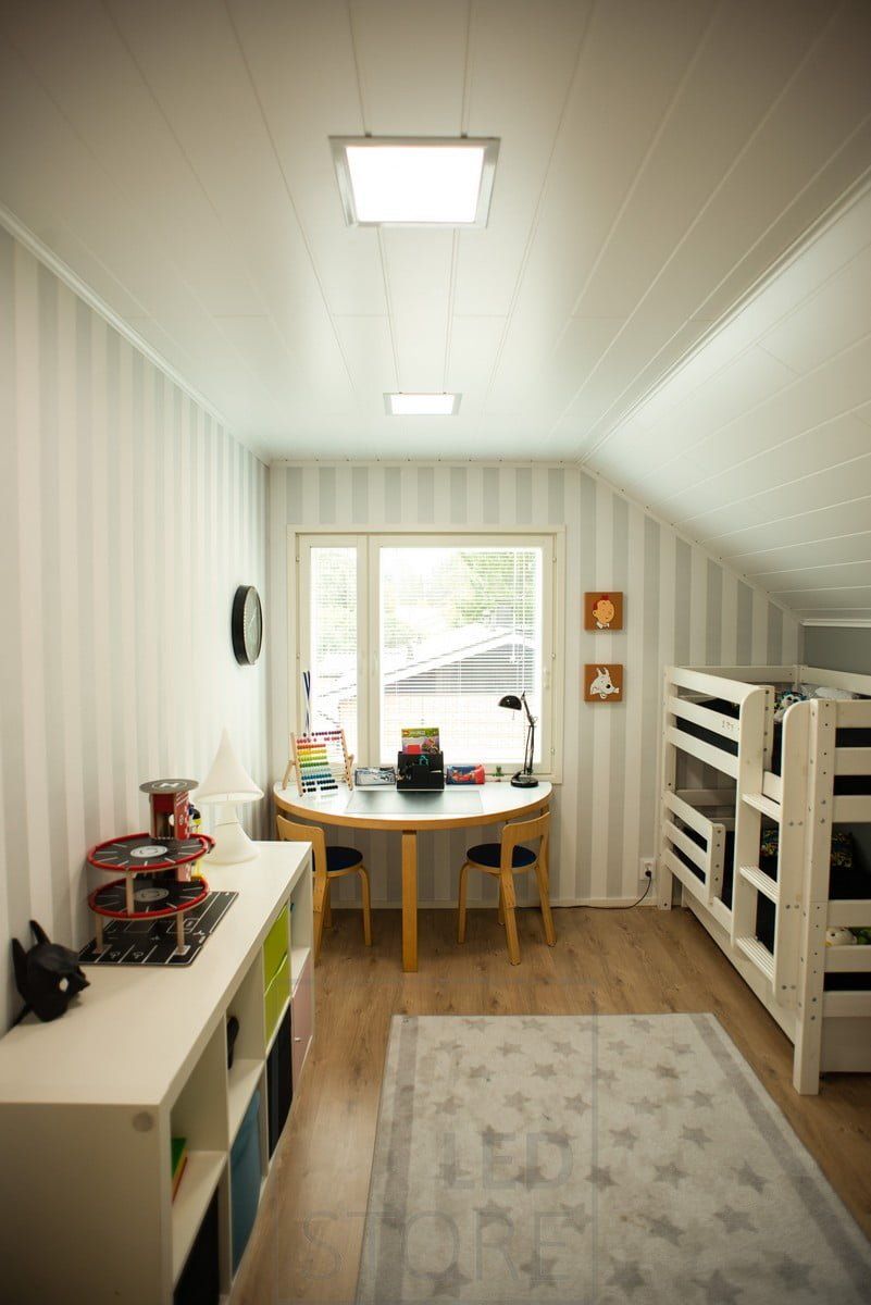 Nursery lighting - ceiling lighting with colour temperature controlled LED panel lights. The warm light is soothing. Ledstore.fi