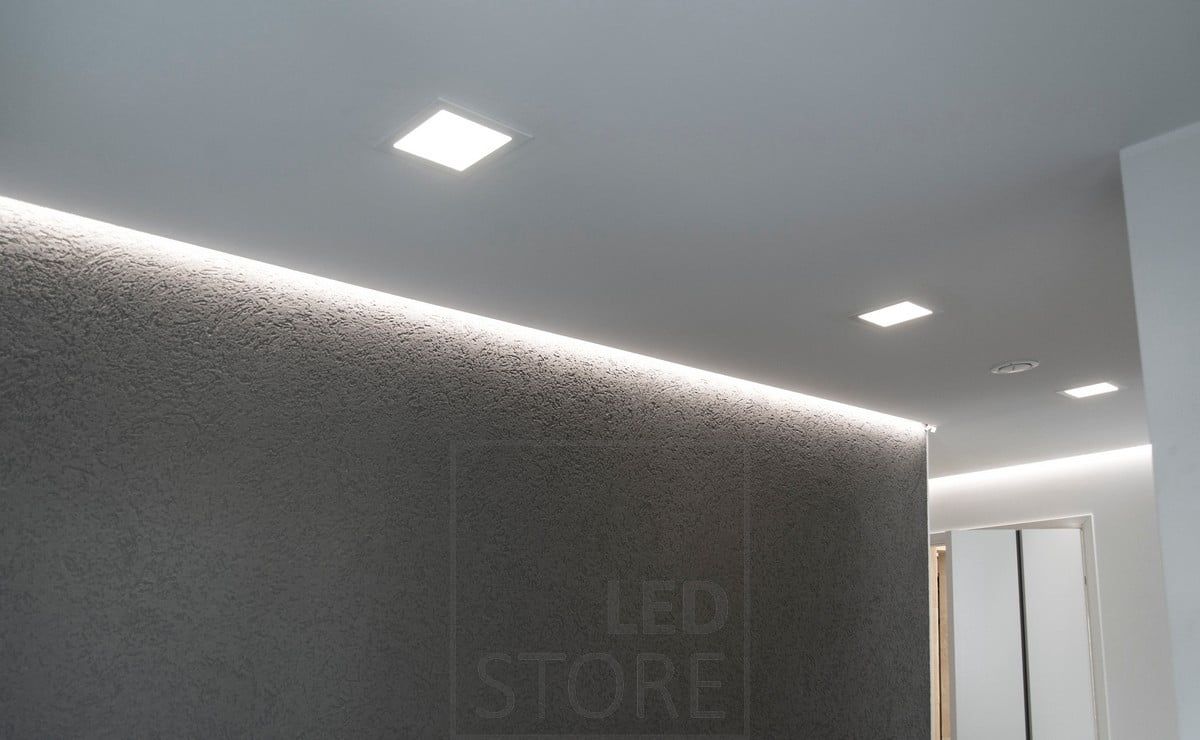 The general lighting panels blend beautifully into the ceiling and the LED strip lighting provides indirect mood lighting through the wall. Ledstore.fi
