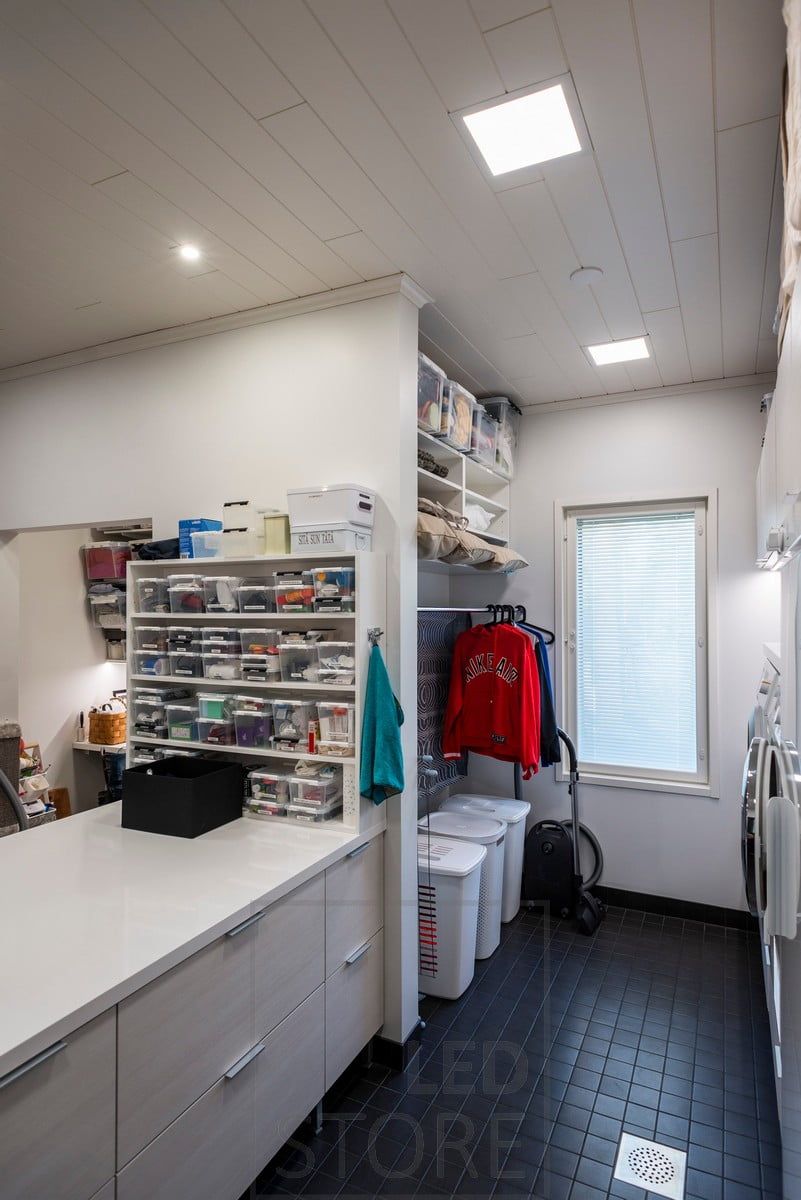 Lighting in the utility room implemented with LED panel lamps and spotlights. Ledstore.fi